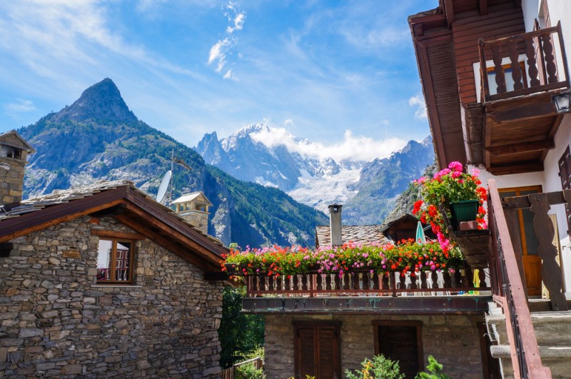 Beautiful traditional house with flowers in Courmayeur, Italy